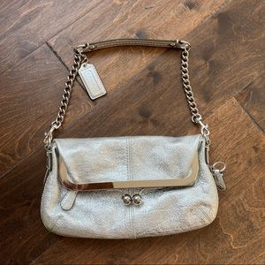Brand new Coach silver met olive bag with kiss lock. Functional&chic.